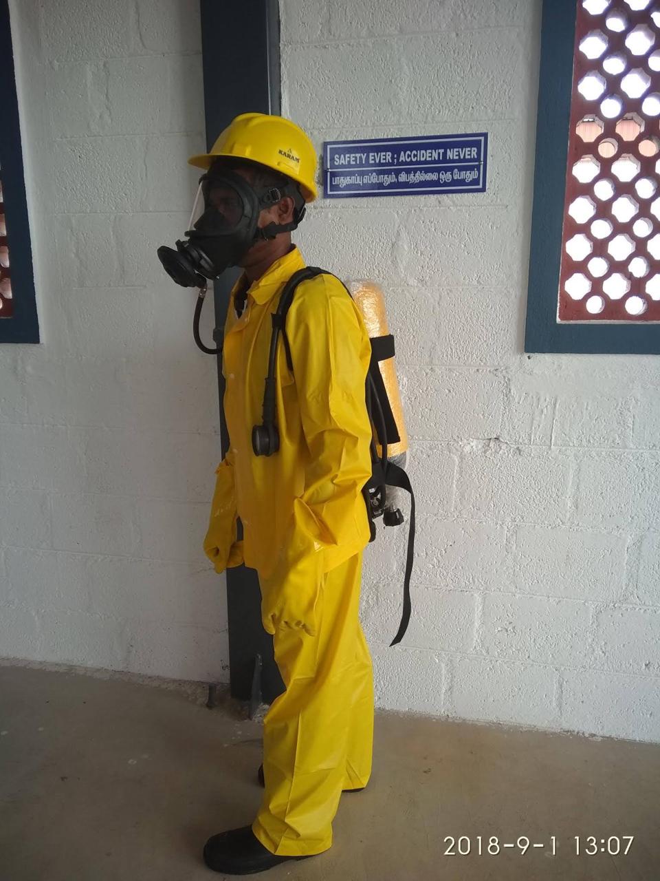Chemical protective suit and breathing apparatus
